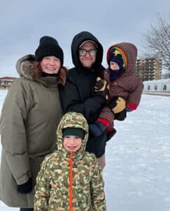 Andrew and Rebecca with kids in the snow in their home state of Wisconsin