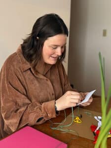 Rebecca doing needle craft